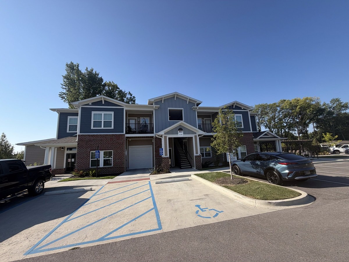 City Heights apartment building exterior with accessible parking